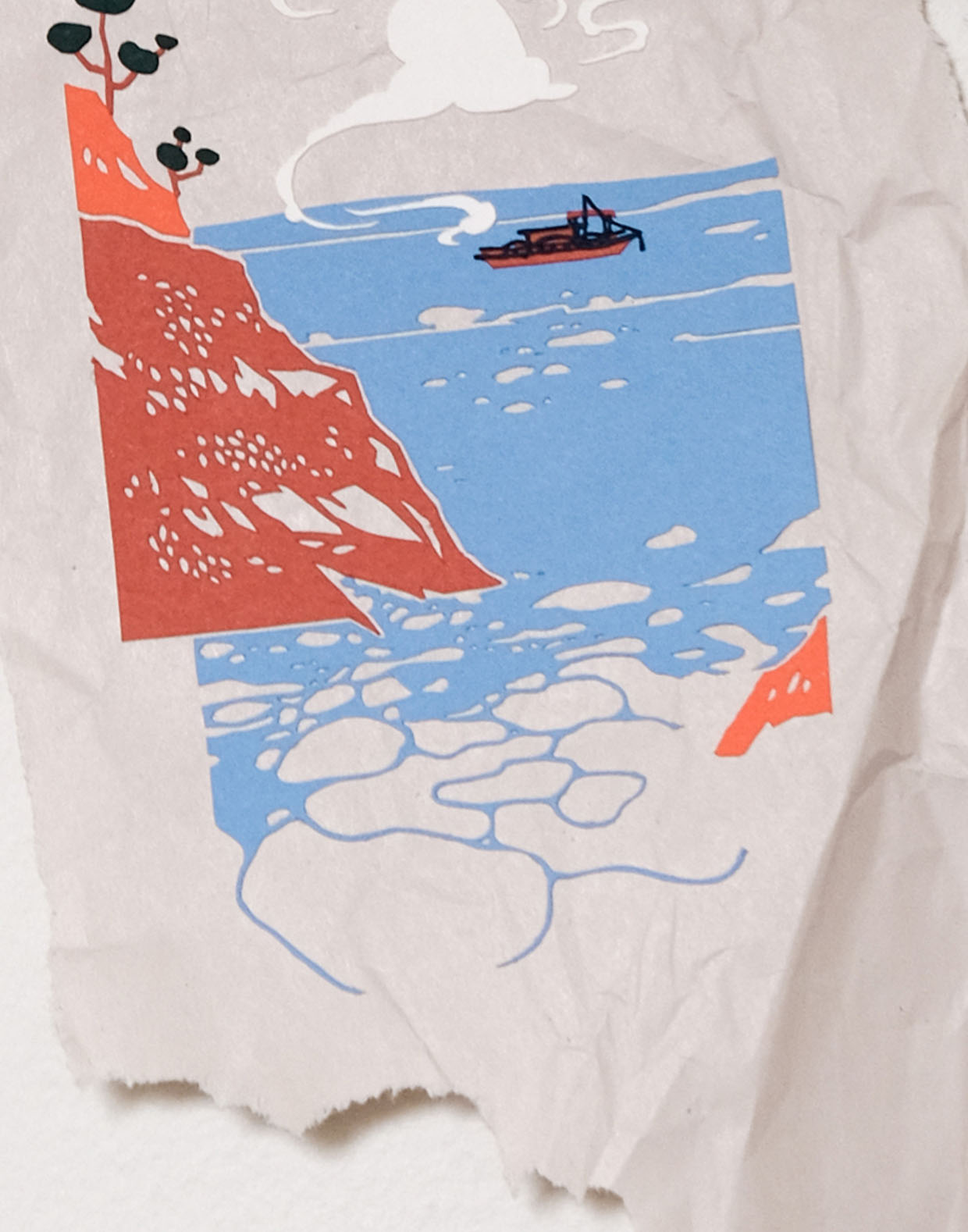 A closeup shows the intricate details of blue trim and fishing tackle on the fishing boat, as well as the cutout textures in the water and the cliffs.