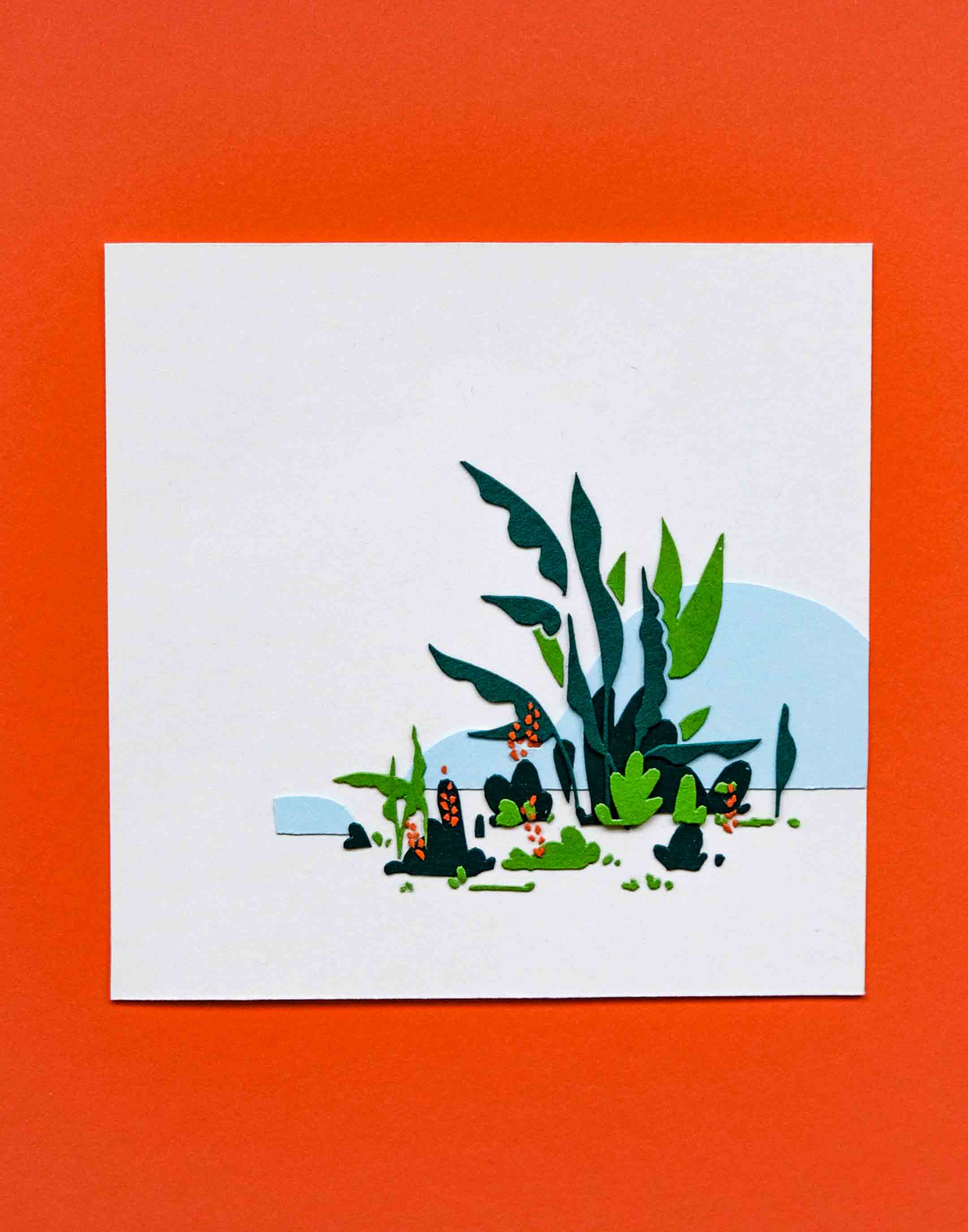 A small square artwork depicts tropical green plants in front of blue hills. The artwork is on an orange backdrop.